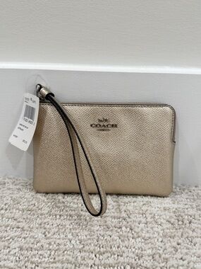 Coach • NWT Metallic Champagne Gold Wristlet with tags and box